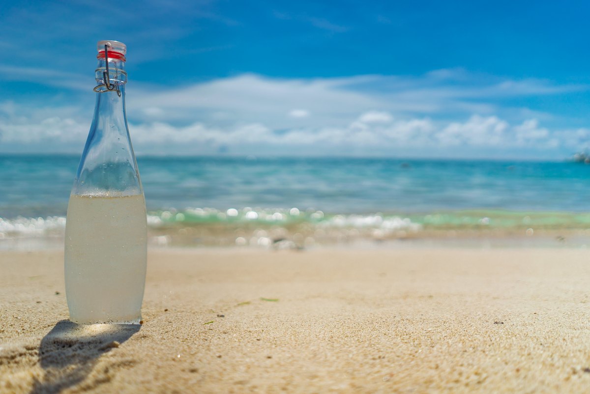 water bottle on beach